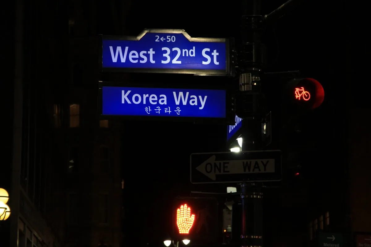 Illuminated neon signs along 32nd Street Korea Way in Midtown Manhattan