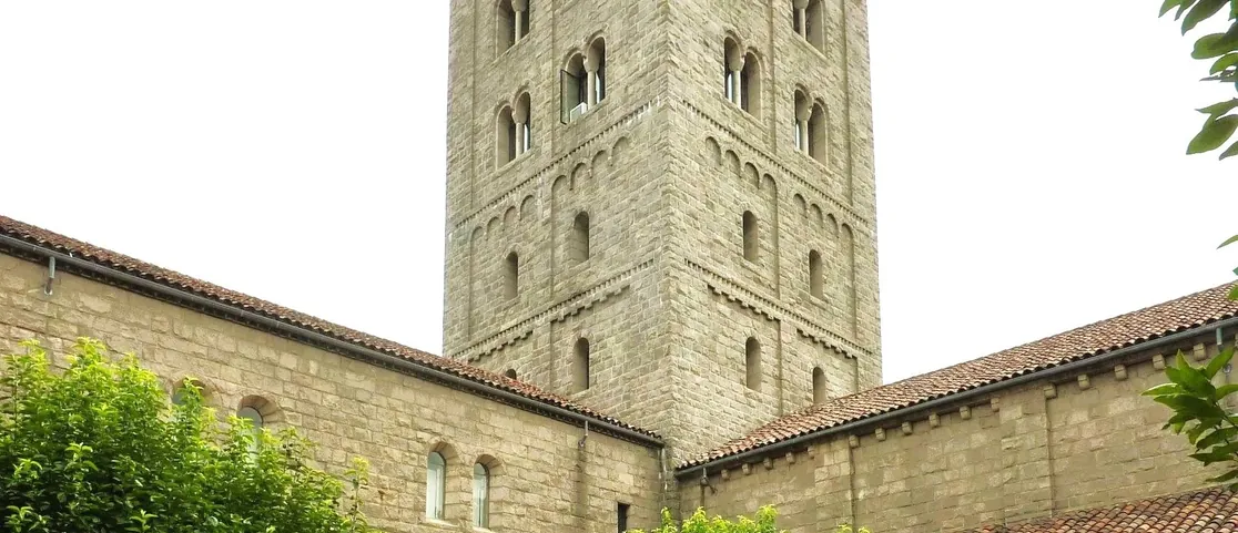 Marble columns of the Cuxa cloister surrounding a planted courtyard at The Cloisters