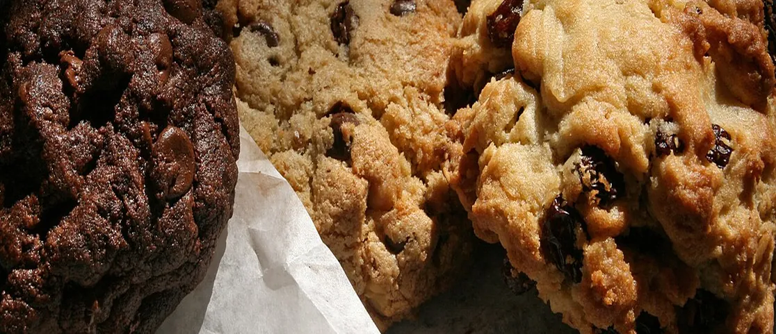 Famous Levain Bakery cookies including Chocolate Chocolate Chip, Oatmeal Raisin, and Chocolate Chip Walnut