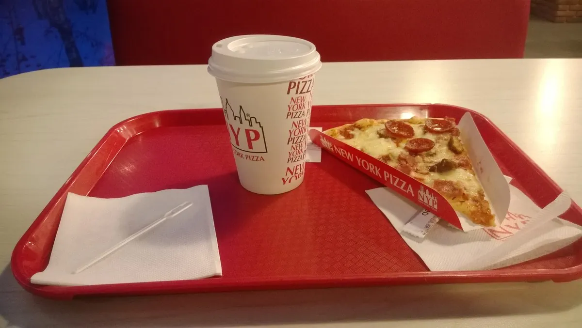 Classic New York cheese and pepperoni slice fresh on wax paper