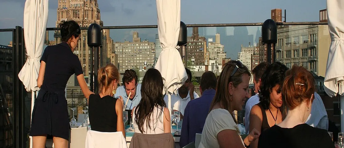 Rooftop terrace with swimming pool and panoramic city skyline in Lower Manhattan