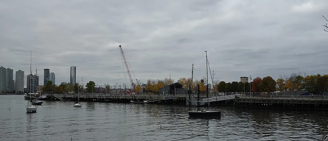 Pier 25 playground in Hudson River Park with water features, mini-golf, and breezy riverfront views