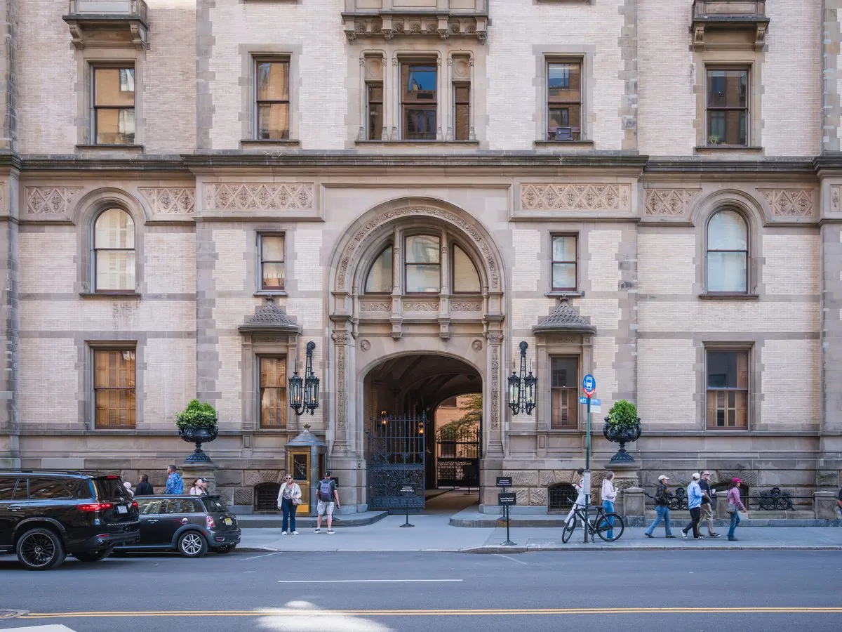 The Dakota historic building and tree-lined street view on West 72nd Street