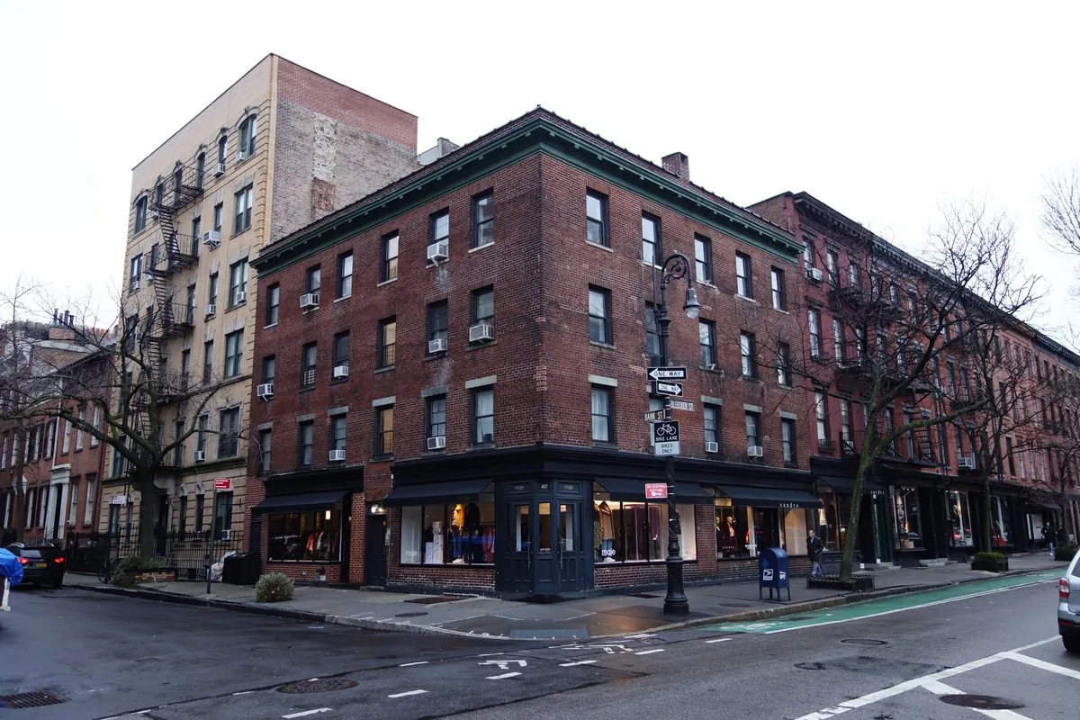 Historic brownstones and boutique storefronts along Bleecker Street